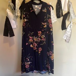 Sleeveless button down dress with pockets